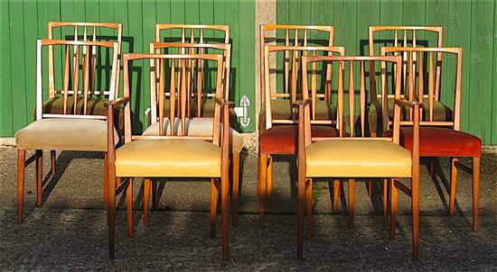 Gordon Russell, extending teak dining table with ten chairs including two carvers W.230cm